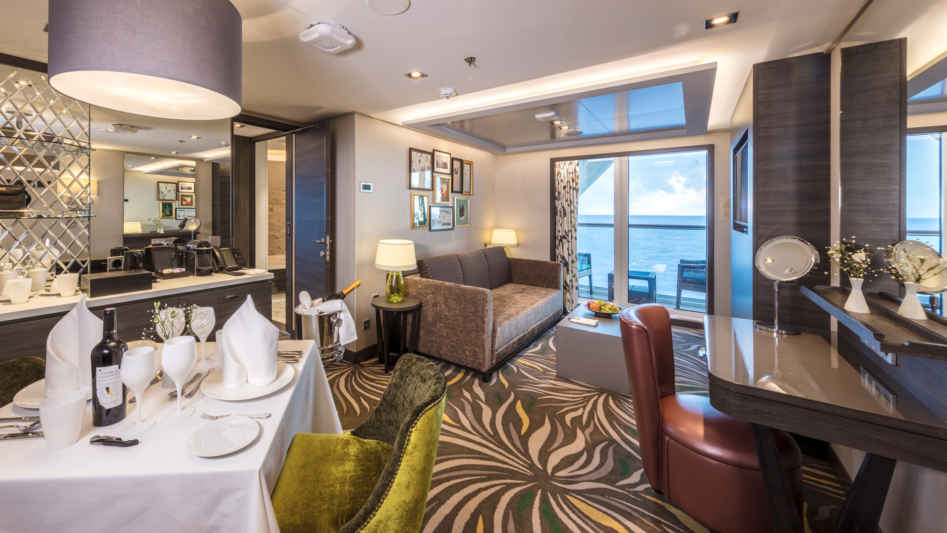 Genting Dream Palace’s Penthouse living room with dining, vanity table and balcony